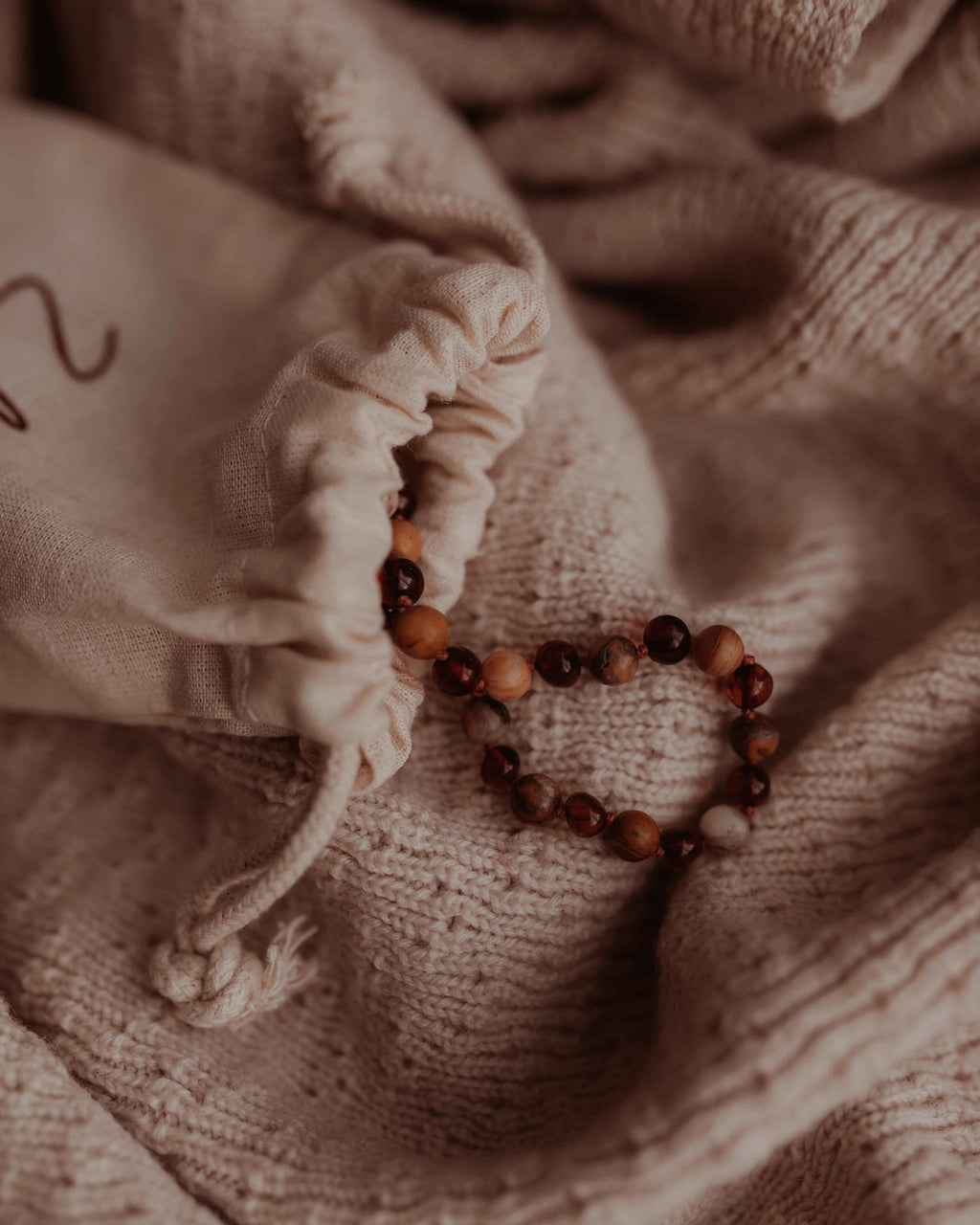 Amber barnsteen ketting zakje cognac agaat