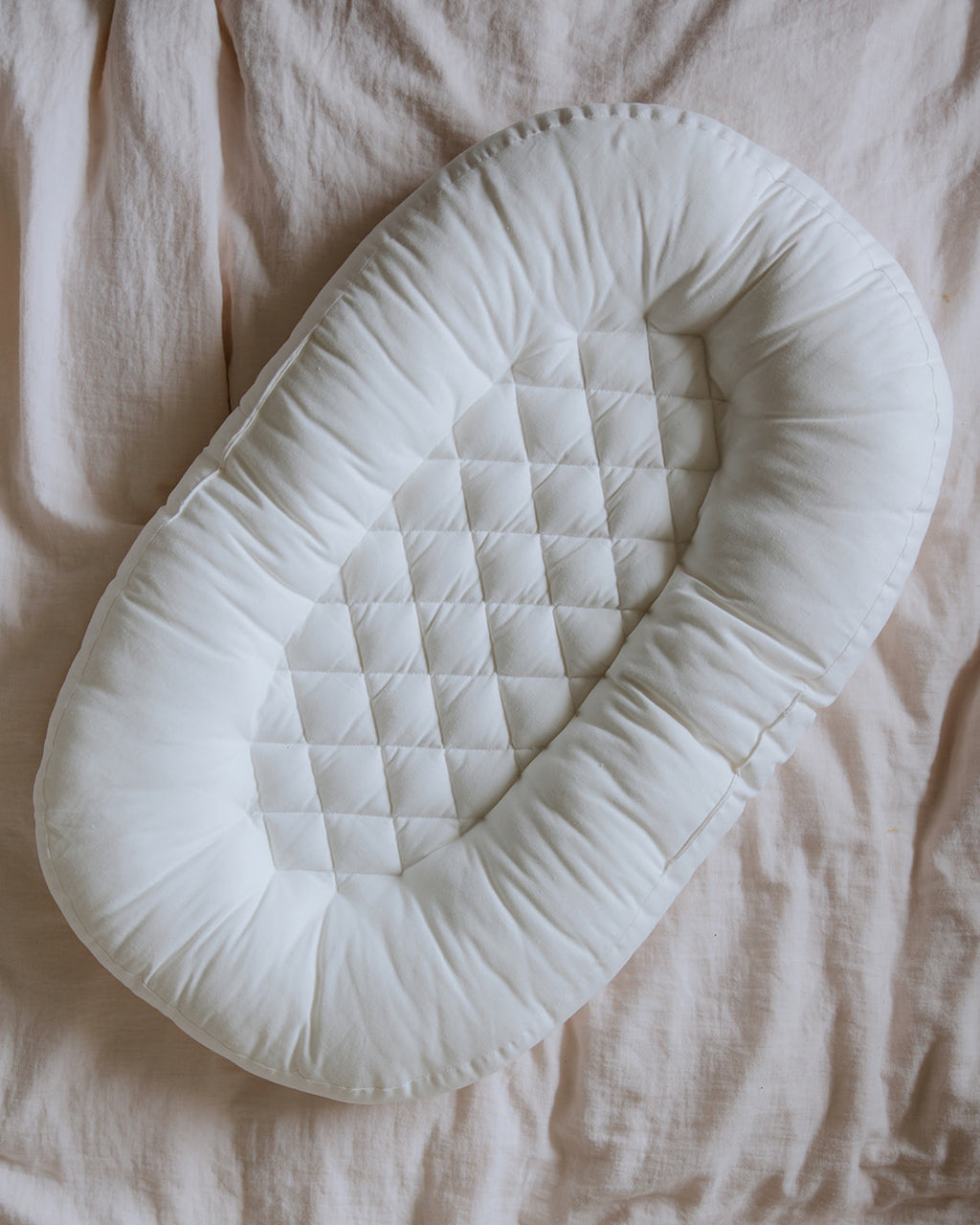 Cocoon company baby lounger wit