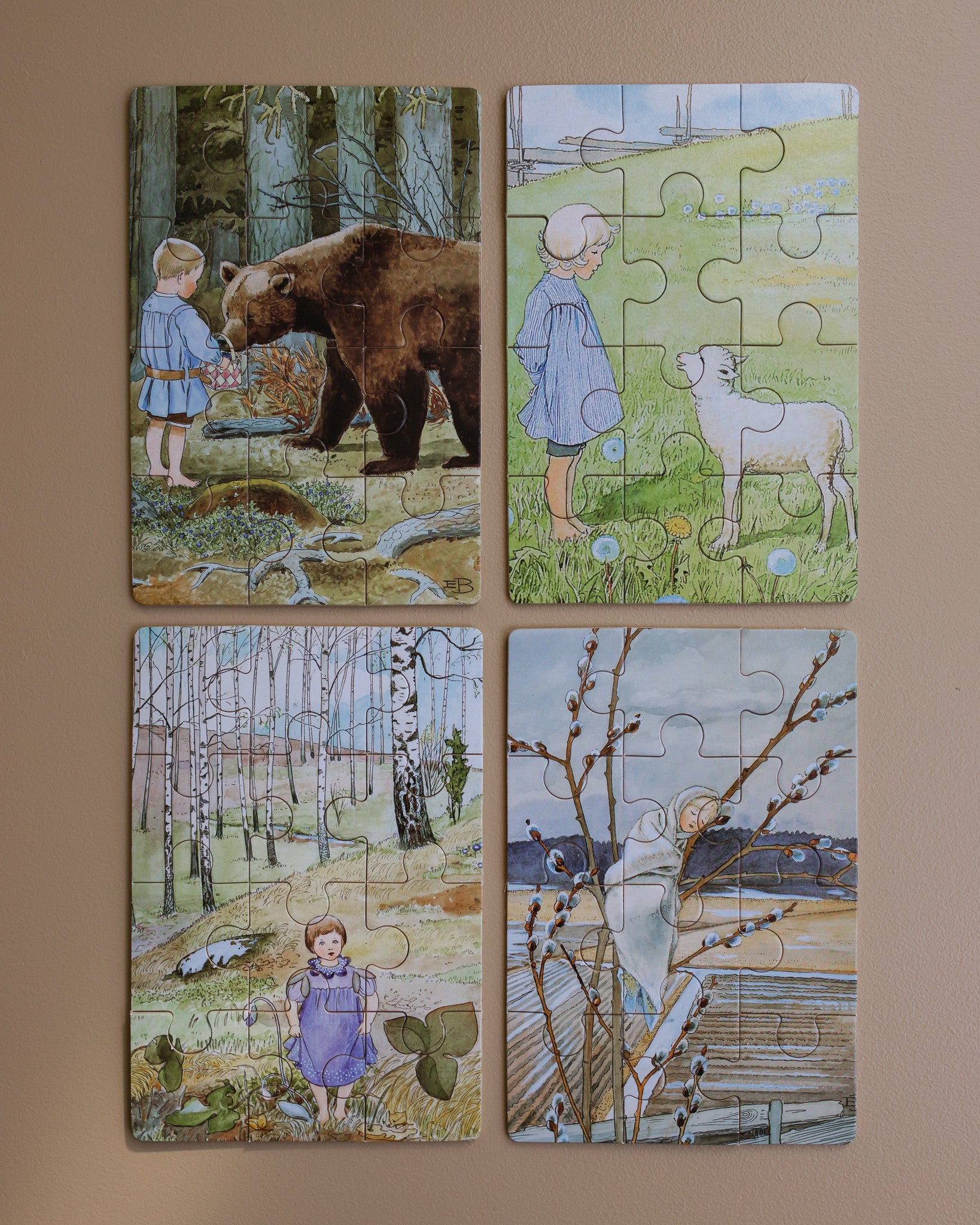 Elsa Beskow vier houten puzzels natuur copyright Ziloen