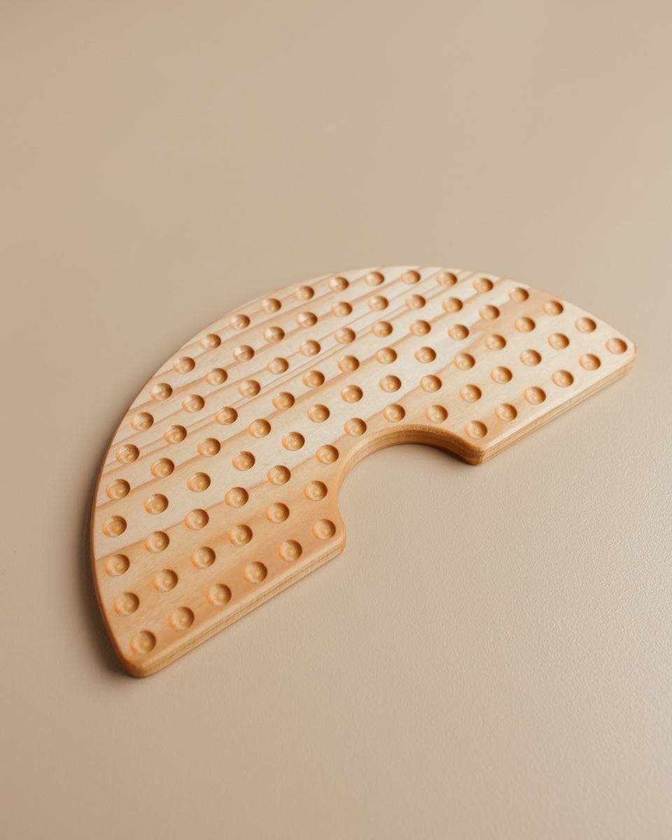 Houten regeboogbord filten balletjes